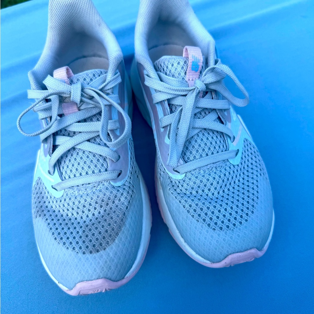 Girls like new new balance size 13.5 sneakers .Grey, blue, baby pink.